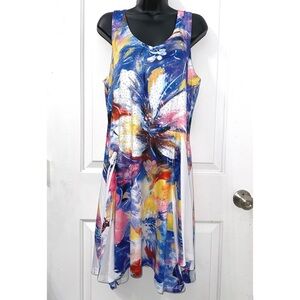 India Boutique colorful, and flowy dress featuring an abstract floral pattern